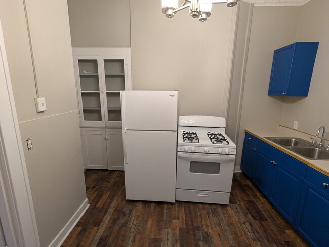 Kitchen with cabinet and walk in pantry (not seen) - 1 Sherman St