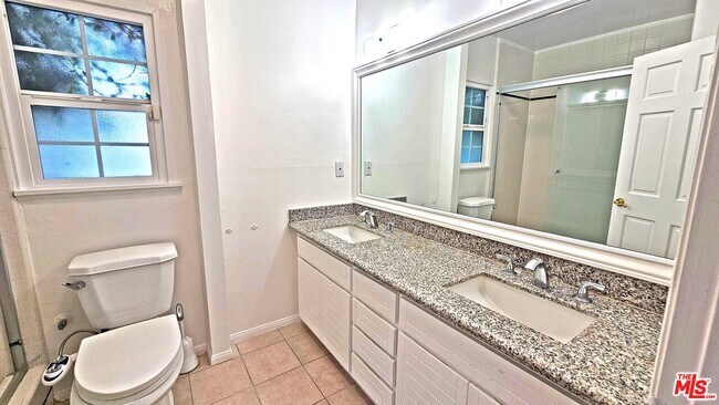 Building Photo - 132 S La Peer Dr