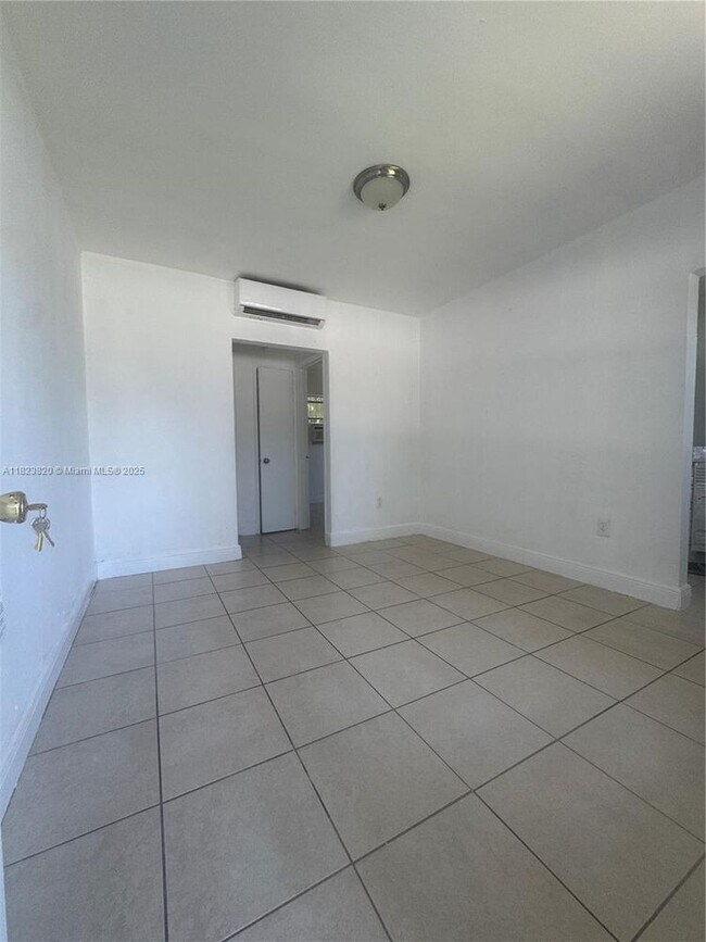 Building Photo - 1590 NW 56th St
