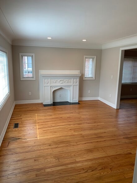 Living room w/ fireplace and recessed lighting - 6012 Whittier