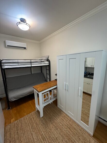 Detail of cording armoire and queen futon and twin upper bunk - 4 Center Ct