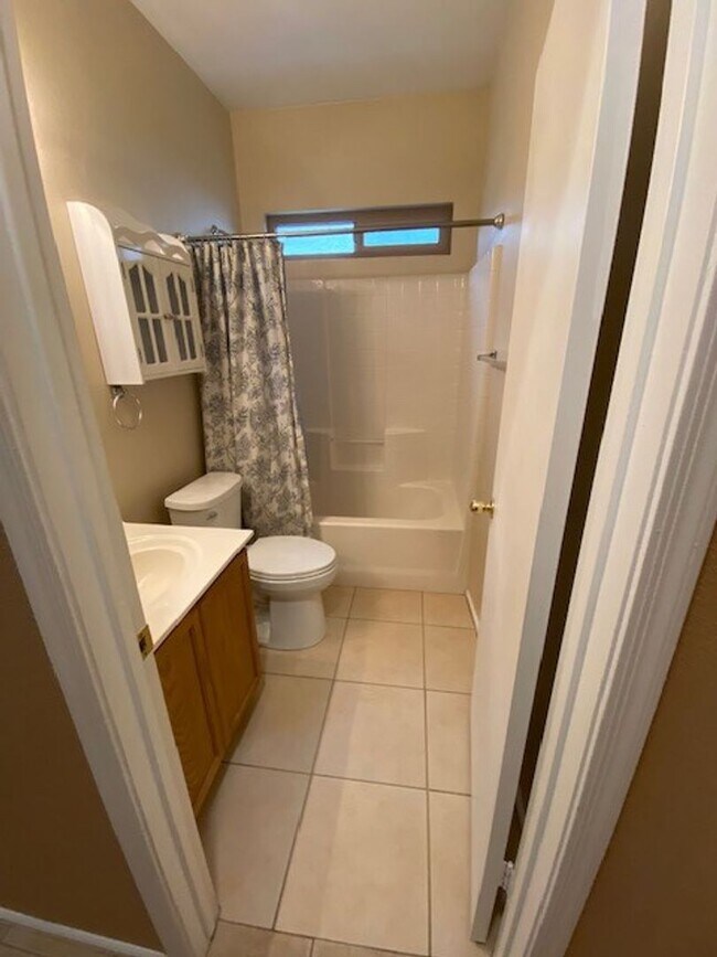 Building Photo - Beautiful 3-Bedroom Home with Vaulted Ceilings & Private Fenced Yard
