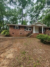Building Photo - Charming 2-Bed Duplex with Hardwood Floors...