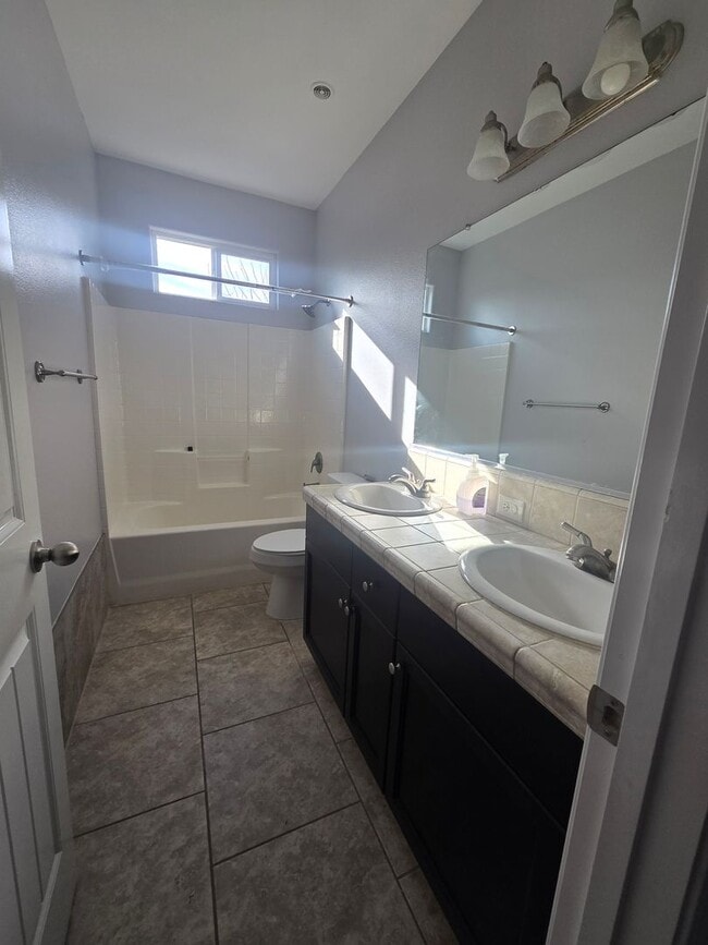 Building Photo - 4 BR 2 BA home available now