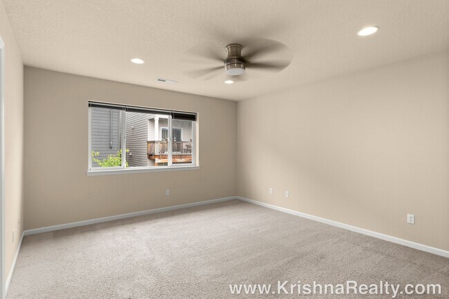 Building Photo - Spacious 4-Bedroom + Office Home in Abbey Creek – Modern Finishes, EV Charger & Low-Maintenance B...