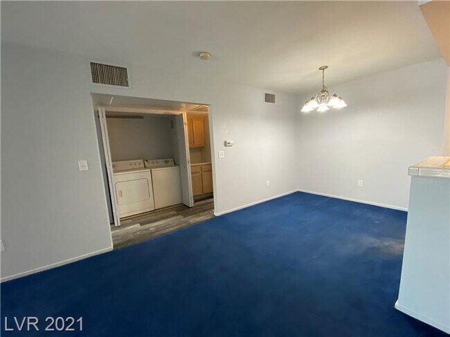 Building Photo - Cozy 1-Bed Condo in Gated 89128 Community ...