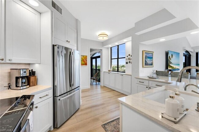 Building Photo - 7040 Pelican Bay Blvd