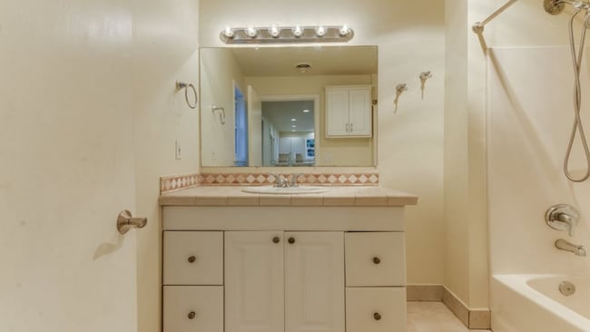 Building Photo - Charming 2 Bedroom 1 Bathroom Bungalow with Oversized 1 Car Garage and Large Manicured  Backyard ...