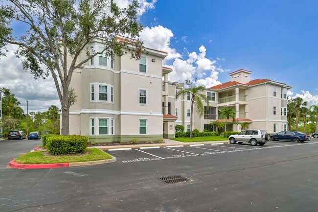 Primary Photo - **ESTERO PRIME LOCATION ~ Top Floor 2/2 Co...