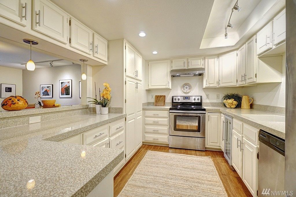 Kitchen and pass through window to dining area - 16929 Inglewood Rd NE