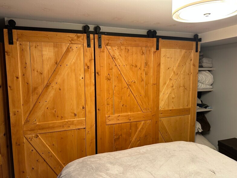 Barn doors on closet - 8932 W 81st Ln