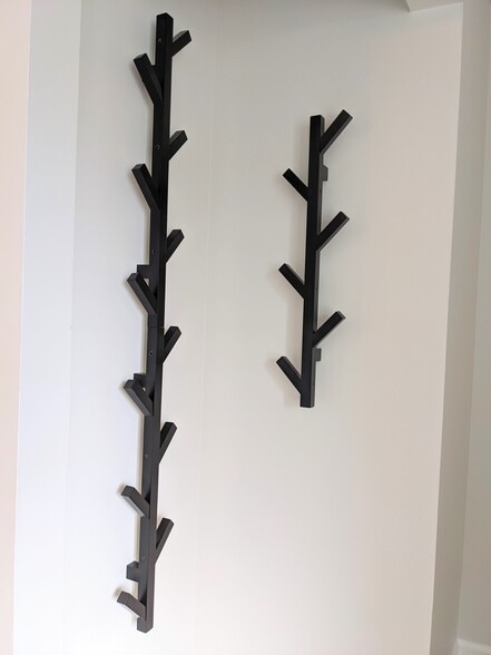 Coat racks in living room offset - 1649 Summerhill Dr