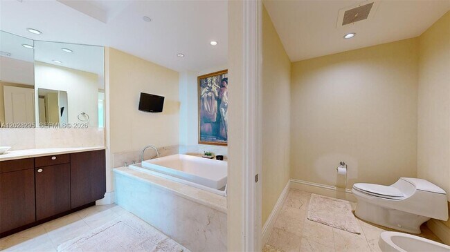 Building Photo - 10295 Collins Ave