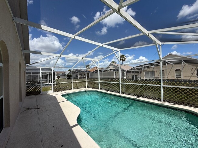 Building Photo - Private pool Single Family House 3 Beds 2 Baths, Resort Style Community. Easy access to Champions...
