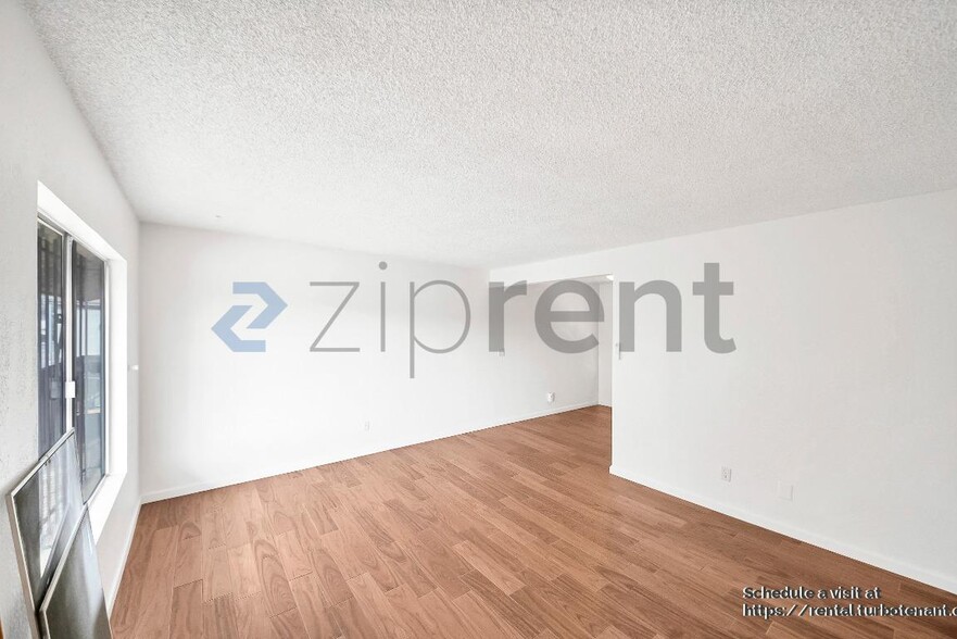 Building Photo - 2458 Normandie Ave