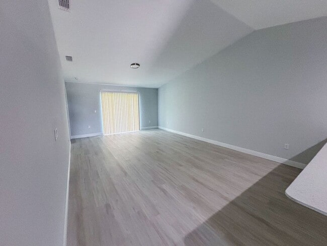 Building Photo - AMAZING OPPORTUNITY! This spacious duplex offers 3 bedrooms, 2 bathrooms, and a 1-car garage