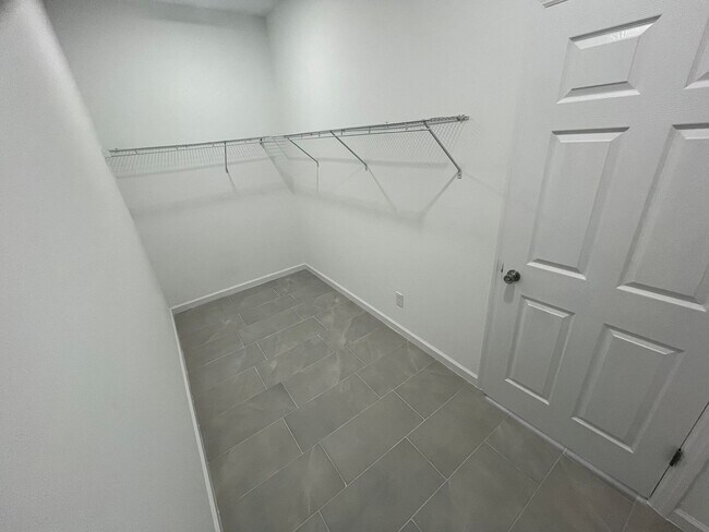 Building Photo - BRAND NEW ONE BEDROOM, ONE BATH-ONE CAR GARAGE- LEHIGH ACRES