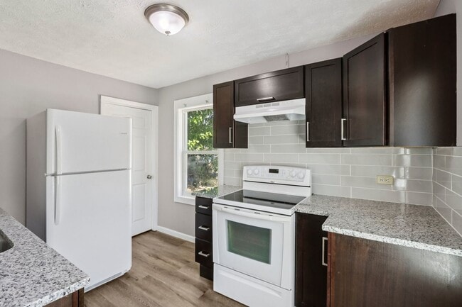 Building Photo - Now Available! West Side Two Bedroom Home ...