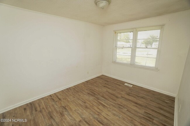 Building Photo - Lawn Care Included in Jville City Limits!