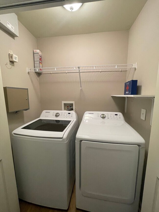 Building Photo - Two Bedrooms Available in this Three Bedroom Flat, Female Applicants!