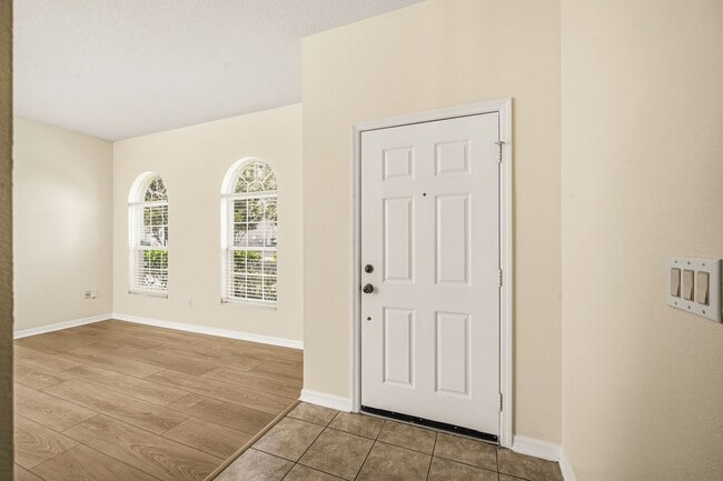 Building Photo - Cozy 4/2 Home Nestled in a Gated Community