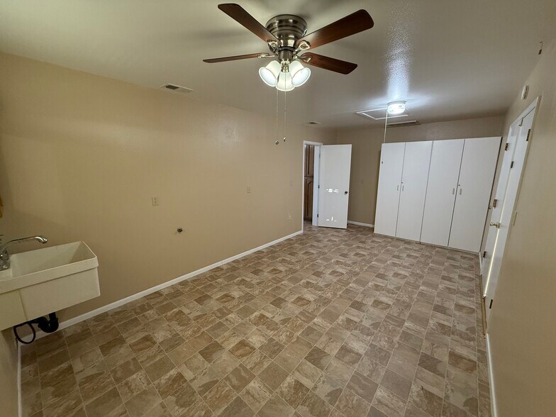 Storage and sink in bonus room - 15936 Lime St