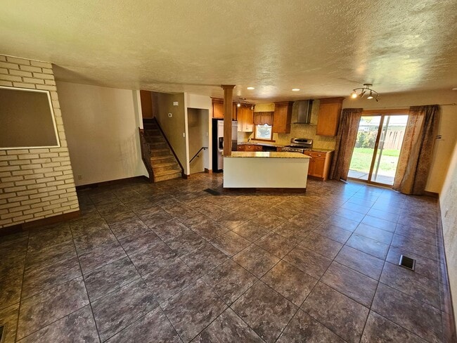 Building Photo - Charming 3-Bed, 2-Bath Tri-Level Home with Spacious Backyard & Gazebo