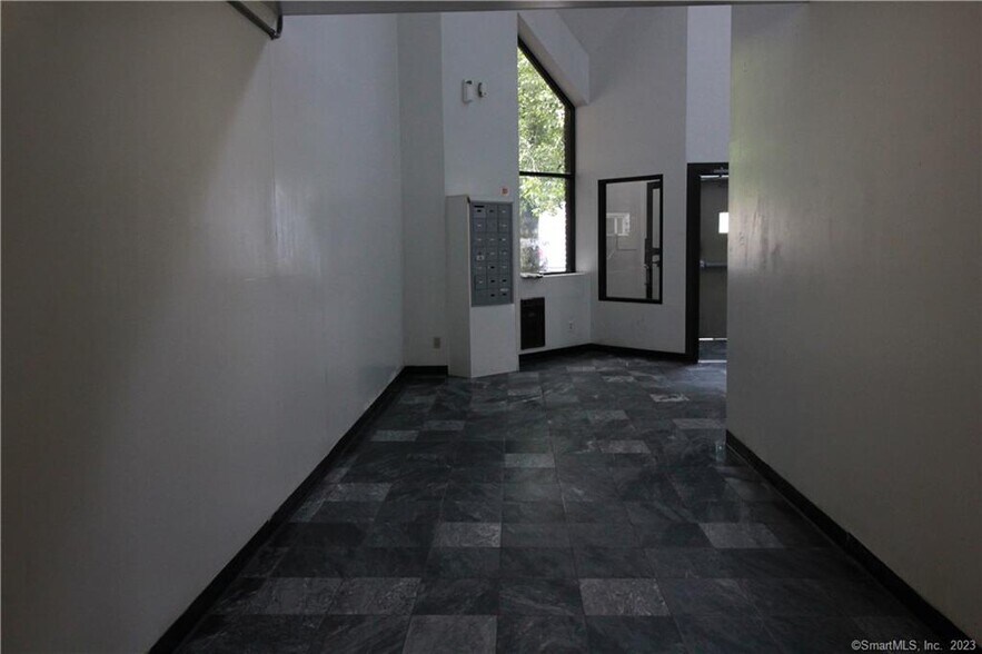 Lobby to/from parking lots, mailboxes and front entrance - 183 Livingston Pl