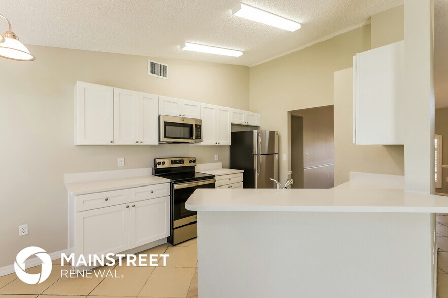 Building Photo - 2704 Champion Ridge Dr