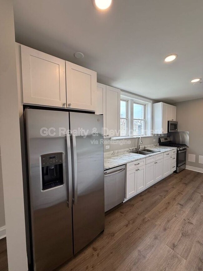 Building Photo - 5730 N Christiana Ave
