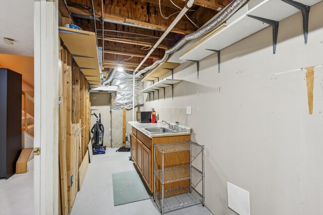 Building Photo - Modern Brick End-Unit Townhome with Stunning Upgrades and Serene Wooded Views