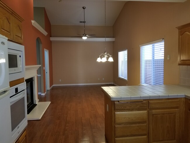 Kitchen view into dining area - 5648 W Millbrae Ave