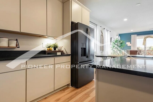 Building Photo - Stylish Main-Level Living with Finished Ba...
