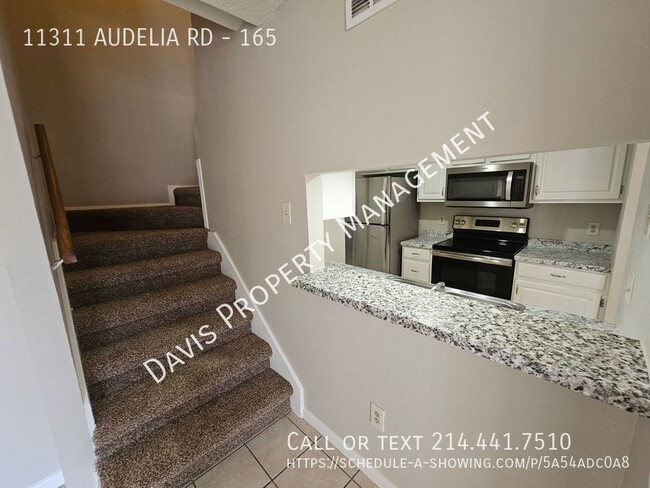 Building Photo - 2 story condo, cov parking, patio, full wa...