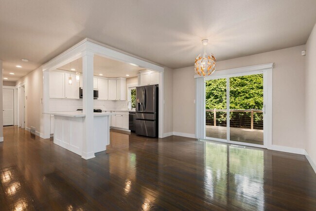 Building Photo - Updated Split-Level Home with Flexible Living Spaces & Backyard Deck