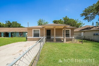 Building Photo - Newly Renovated Single Family Home | 4 BR/2BA | Partially fenced  front yard