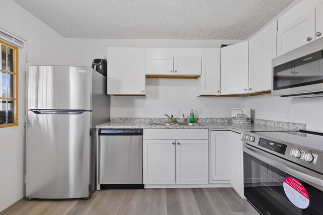 Building Photo - Fully furnished, 2BR Duplex near major healthcare employment centers, colleges, universities, and...