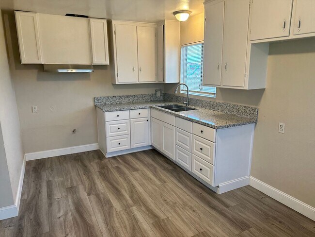 Building Photo - This cute home won't last long with a new ...