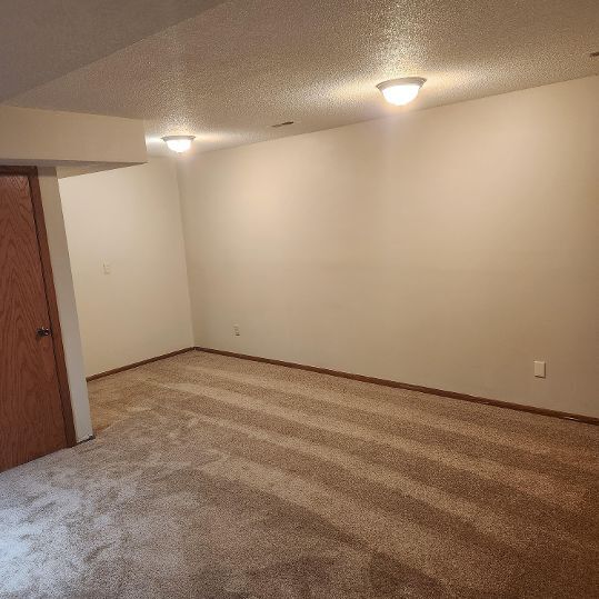 Lower level family room 2nd view - 2050 Bradley St