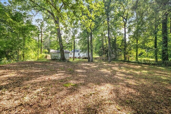Building Photo - Adorable Home, Just Painted, Wood Flooring...