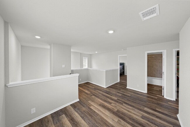Building Photo - Located in the vibrant Valley Ranch commun...