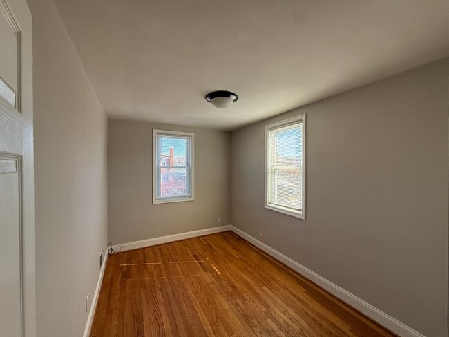 Building Photo - End Unit 3BR Townhome in Dundalk | Fresh Paint, Refinished Hardwood Floors, Fenced Yard, Off-Stre...