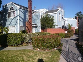 Building Photo - Open and Airy Condo at Country Club Villag...