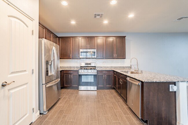 Building Photo - Verrado Living - 4 Bedrooms & 3 Baths!
