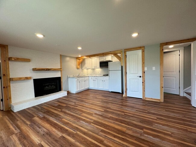 Building Photo - Exquisite Brick Ranch with Modern Upgrades, Countryside Charm And Two Car Garage