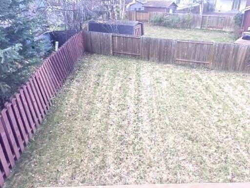 Building Photo - Spacious East Anchorage Home with Yard & Garage!