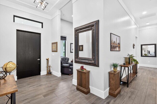 Building Photo - Newly built upscale home on a private 1-acre lot in the quiet Bell Villa community of Bonita Spri...