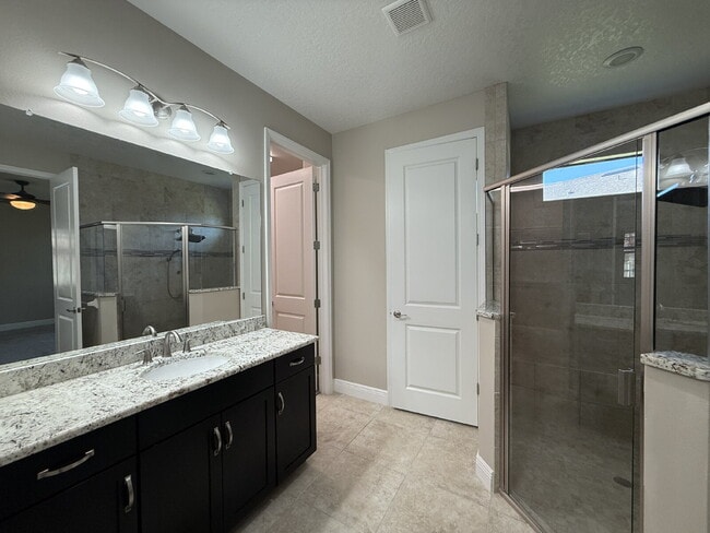 Building Photo - 4BR, 2.5BA home with resort style outdoor living!