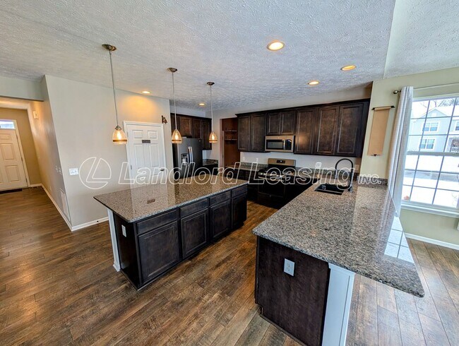 Building Photo - Stunning 5-Bedroom Home in Northpointe Estates with Finished Basement