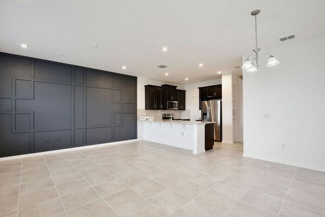 Building Photo - Luxurious 3/2.5 Modern Townhome with a Private Balcony and a 2 Car Garage in the Exclusive Gated ...